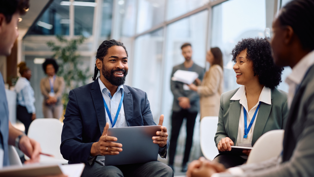 People collaborating in a support group session
