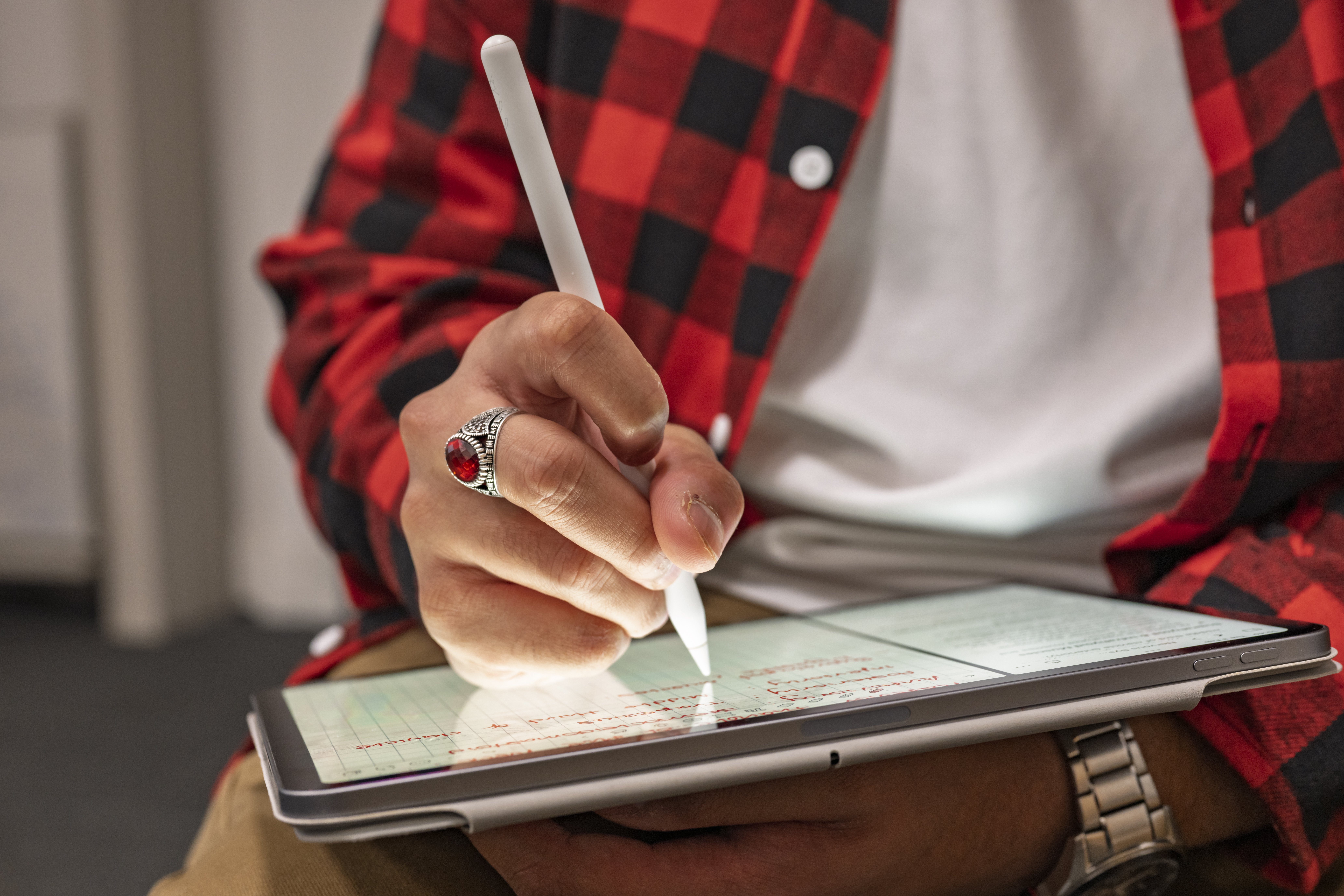 Close-up of student using a tablet